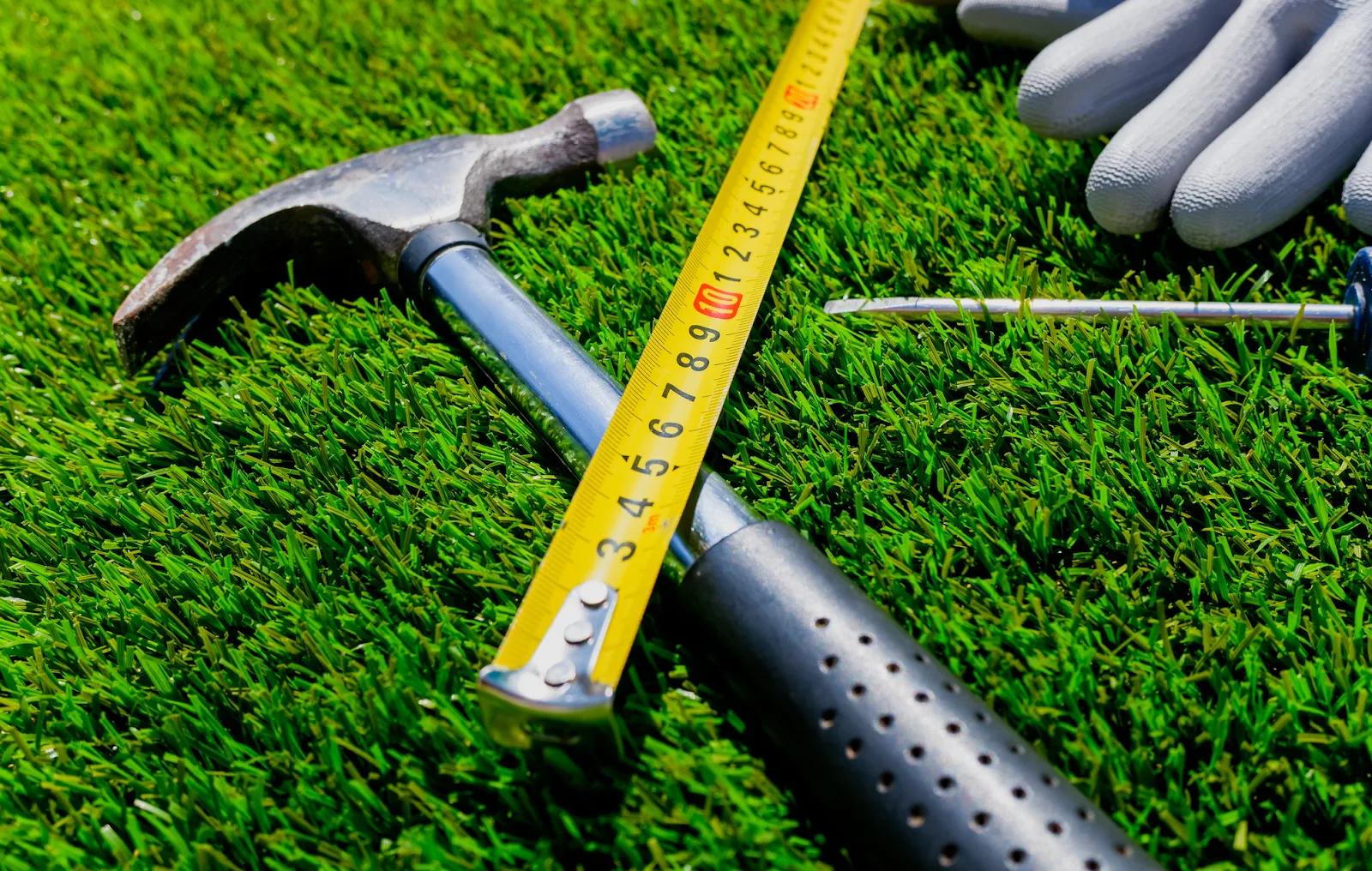 Tools placed on top of artificial turf